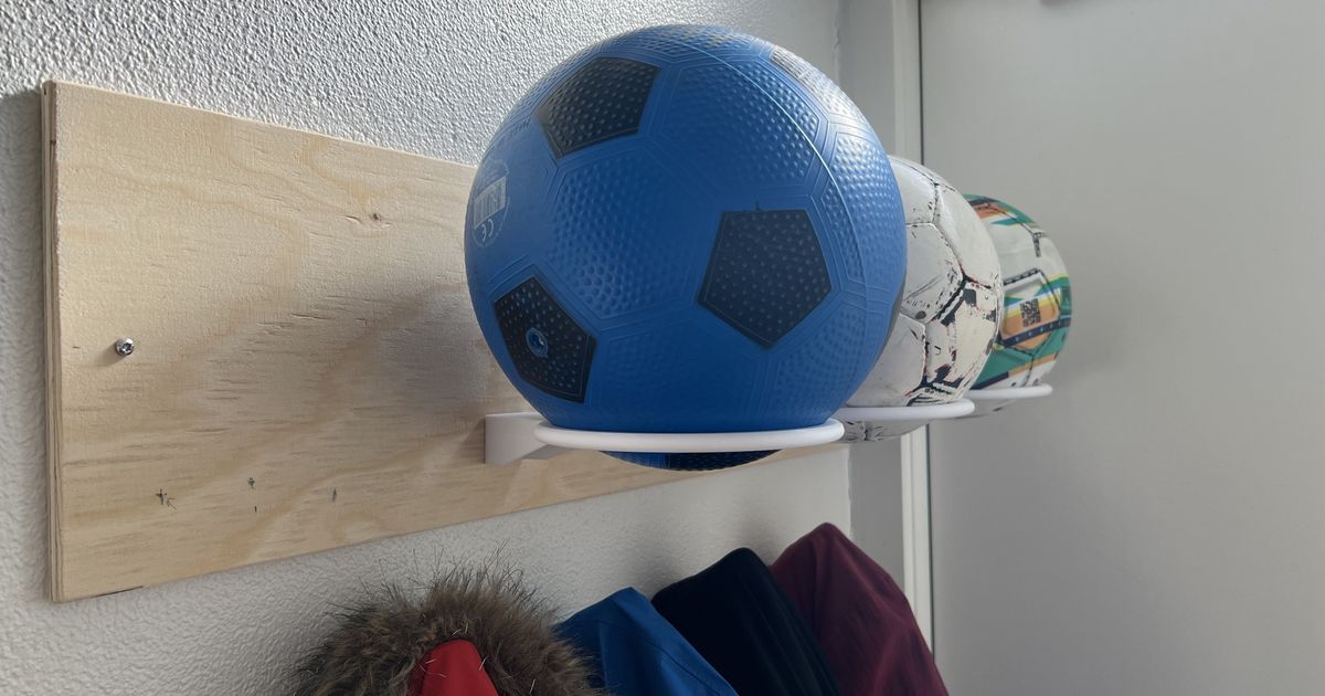 football-holder-wall-mounted-by-the-occasional-extrusionist