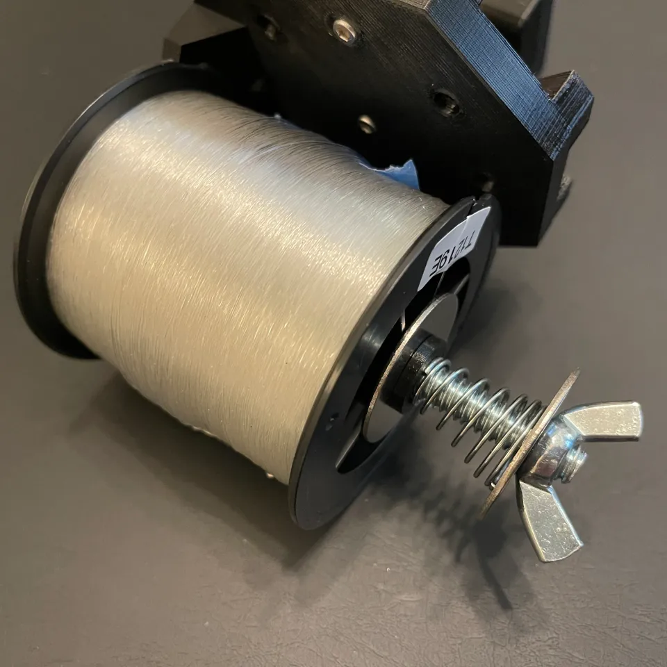Fishing Line Tensioner - Homemade fishing line tensioner constructed from  wood, threaded rod, spools, springs, and hardware.