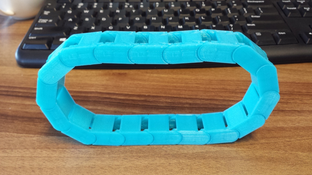 Semi open universal cable drag chain