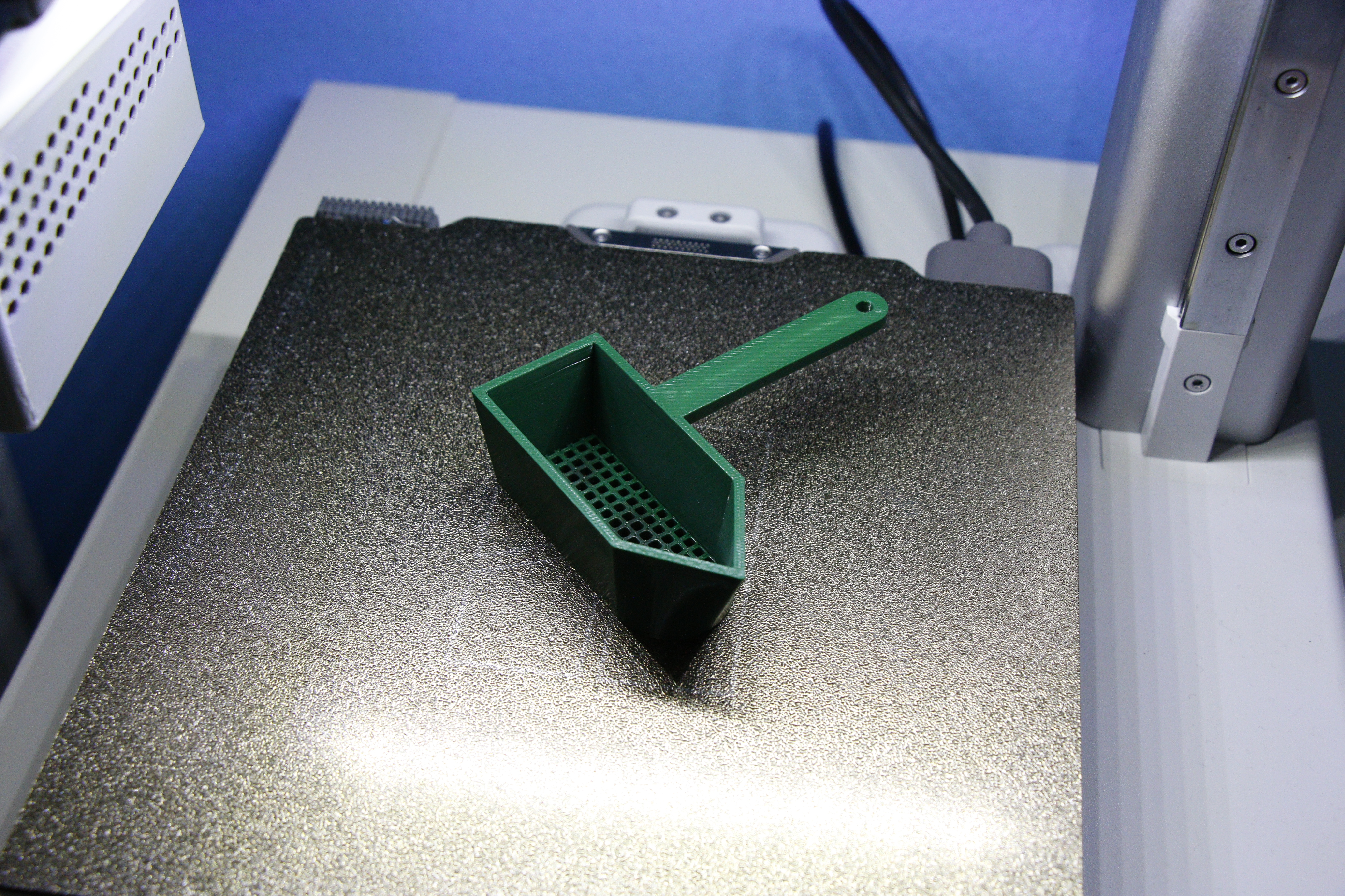 dessicant scoop with sieve, left and right handed.
