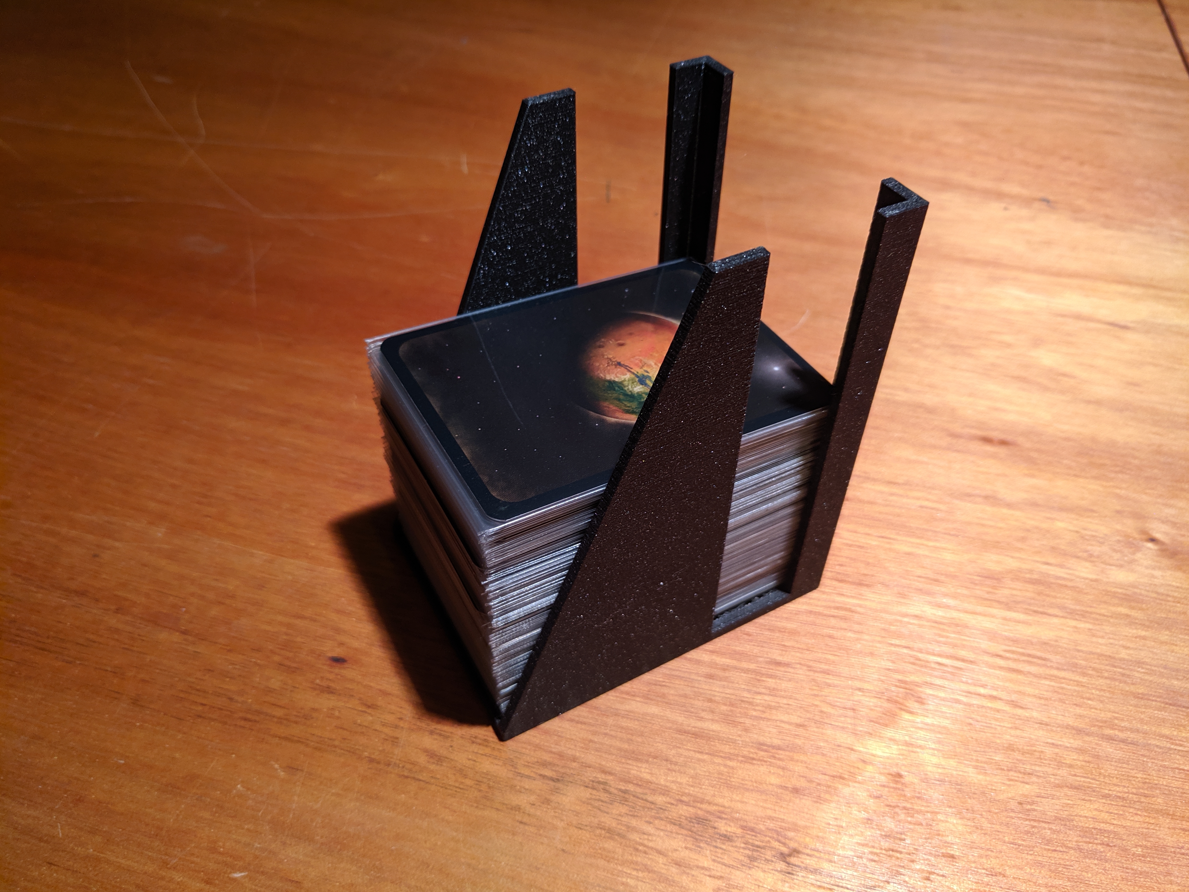 Deck holder for sleeved cards