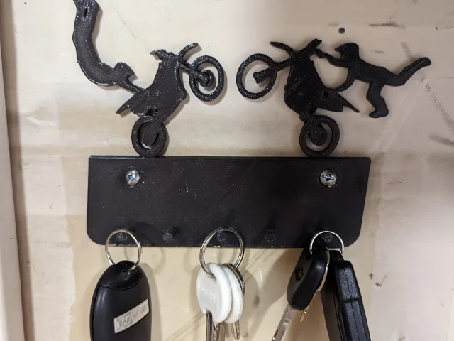 Wall mounted dirt bike key holder