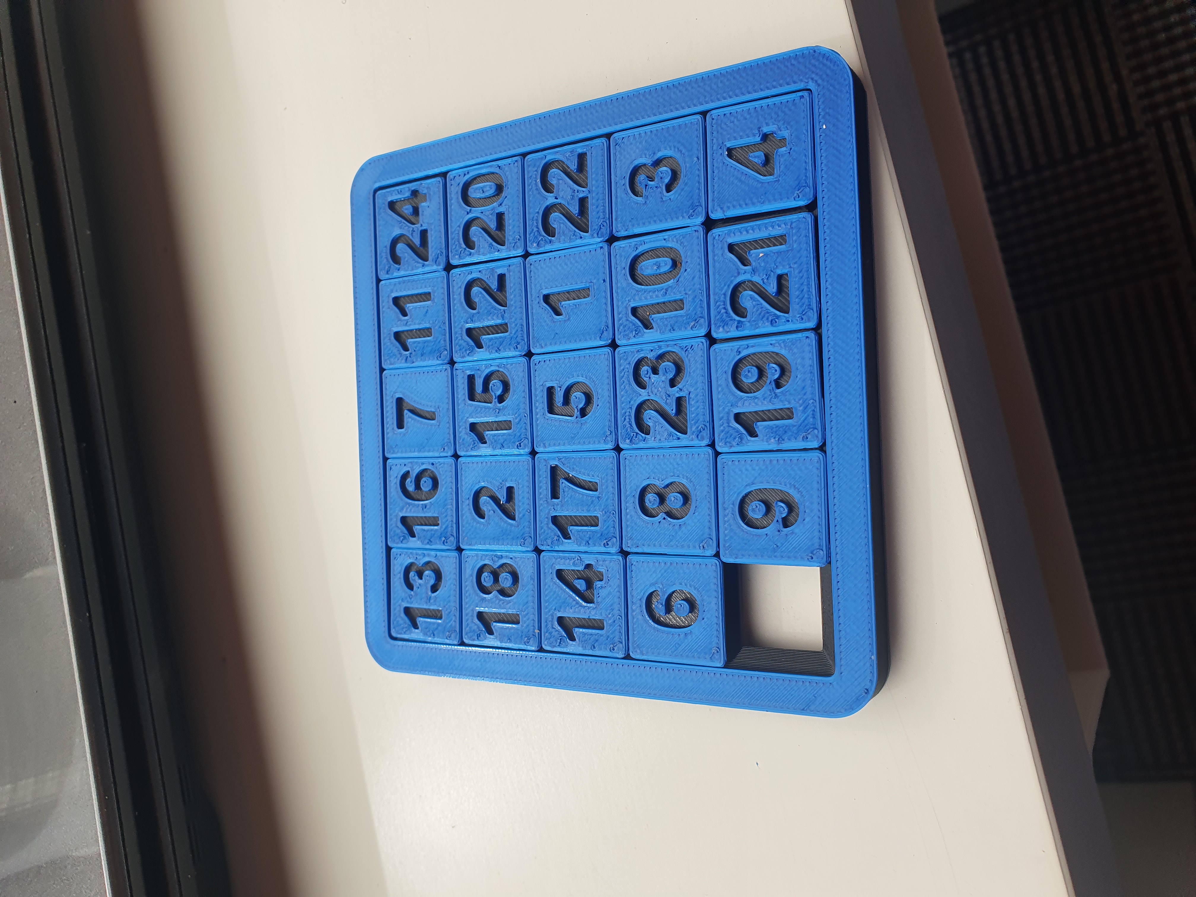 Two-sided sliding puzzle 5x5 (print in place)