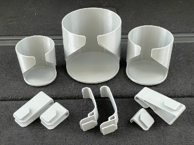 Uchwyty na kubki Rivian - druk 3D