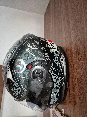 Motorcycle helmet hook