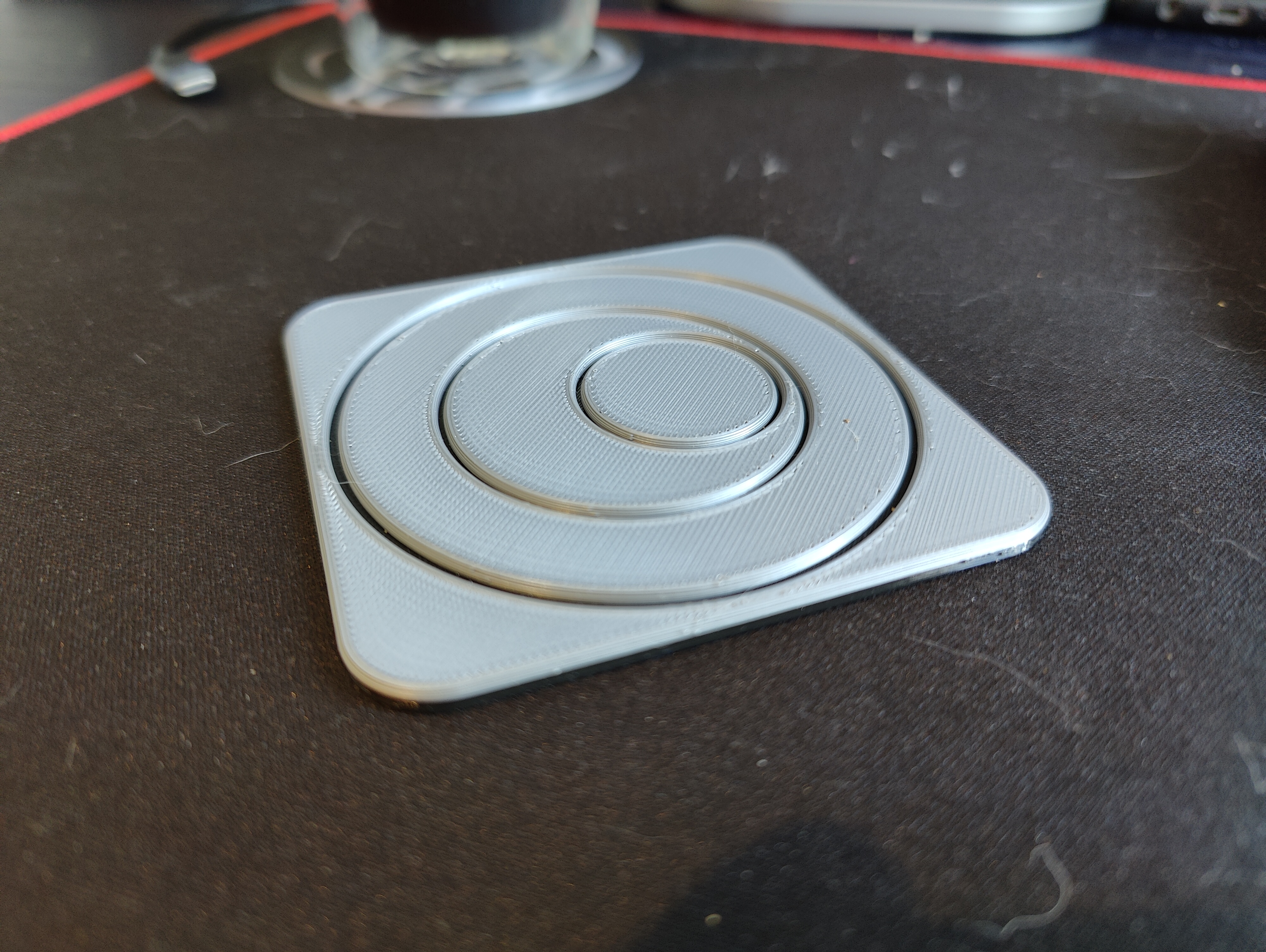 Square coaster with fancy circles