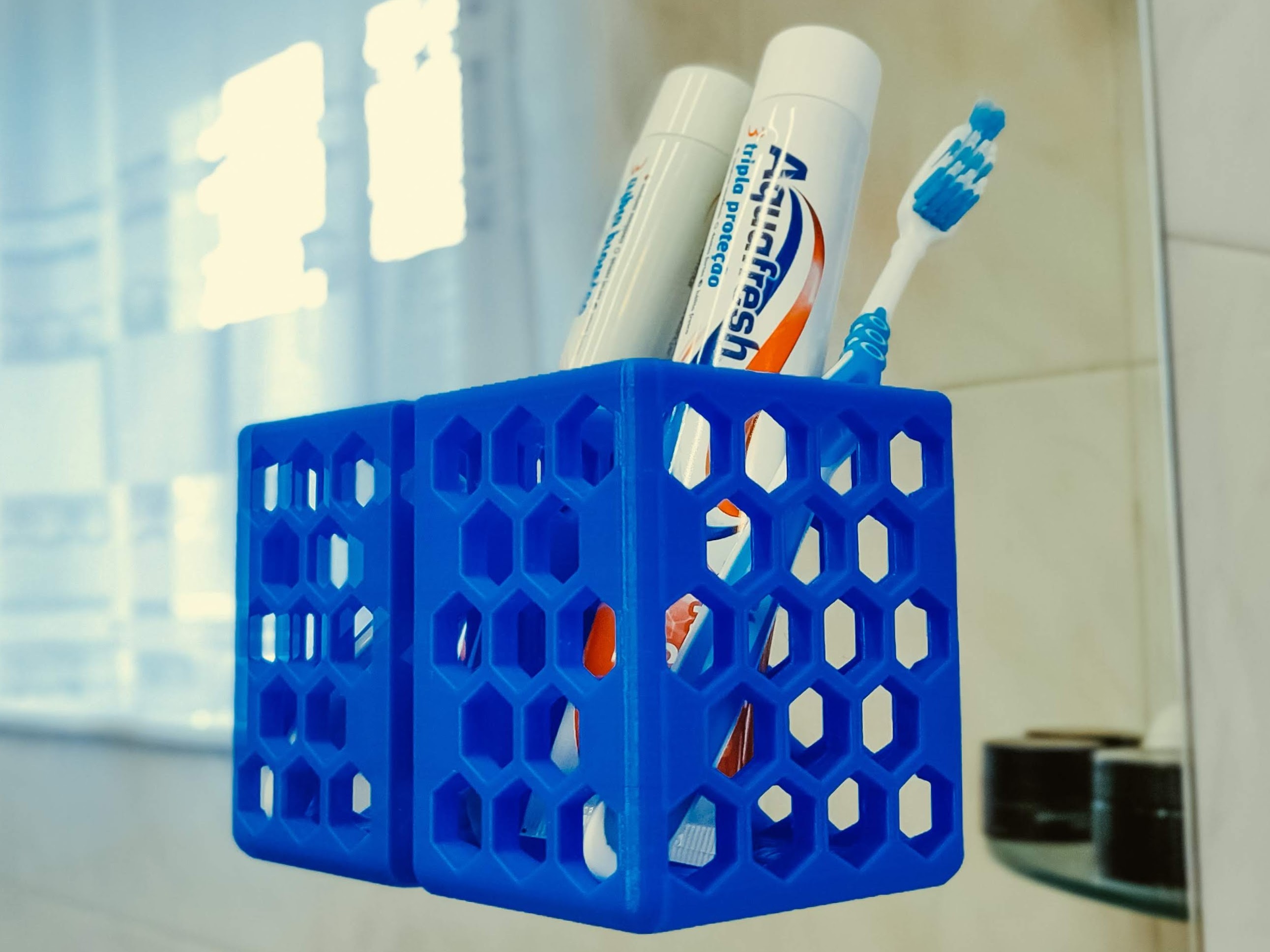 Toothbrush/toothpaste holder