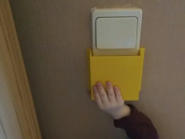 Childproof lightswitch cover