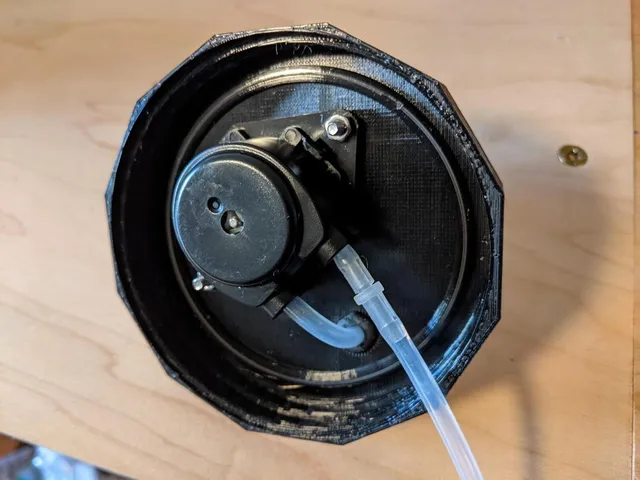 Mason jar lid peristaltic pump mount