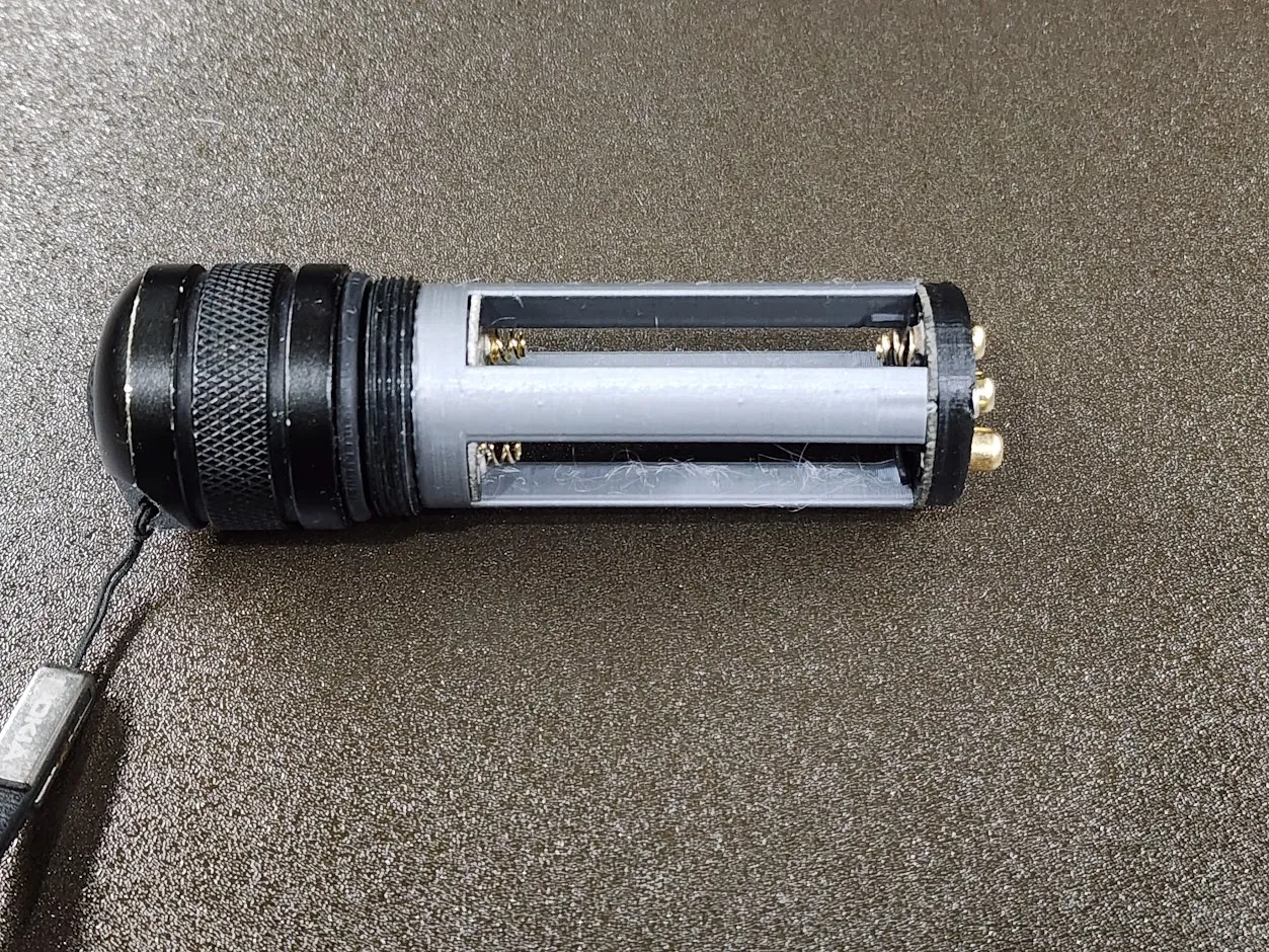 Led Lenser T7 Battery Holder by hardiebotha, Download free STL model