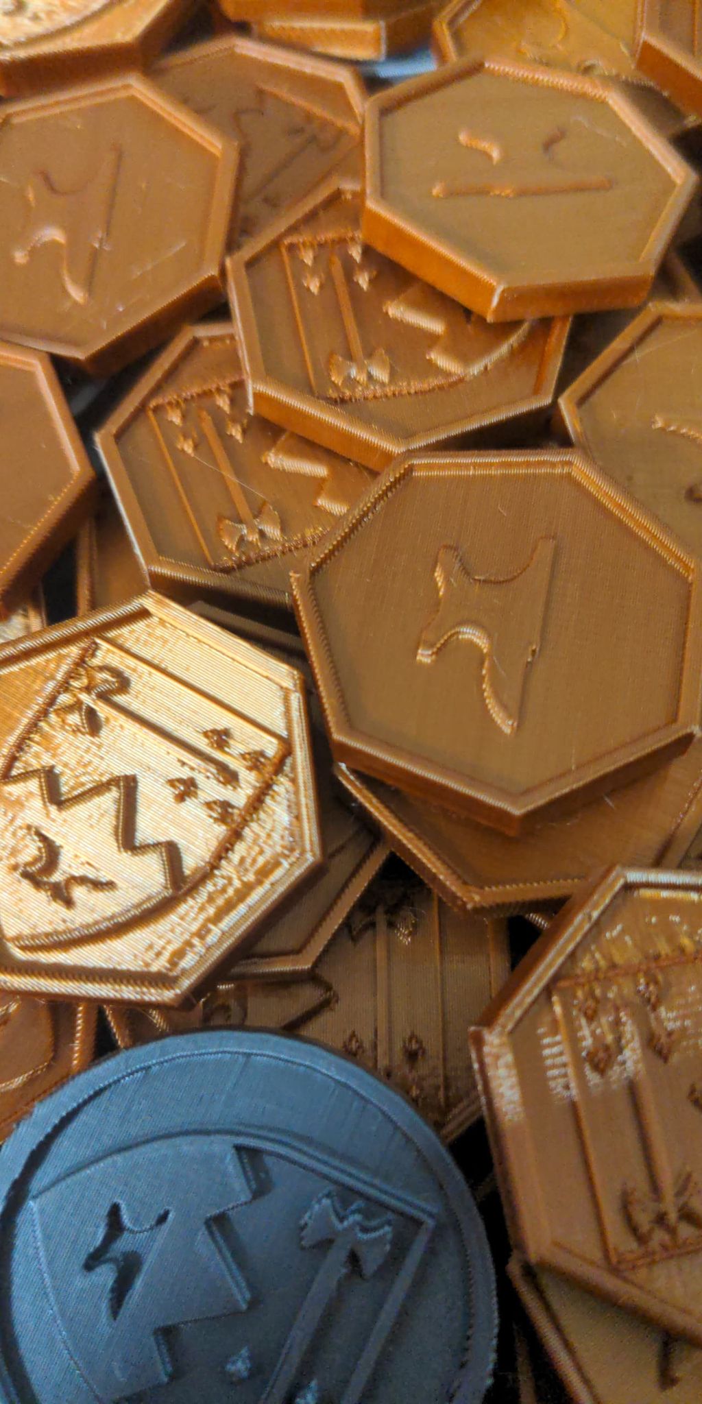 Heptagon anvil currency for a larp.