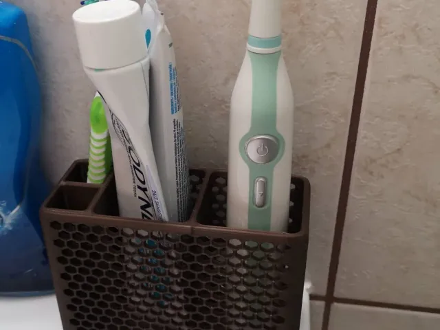 Toothbrush holder with honeycomb design