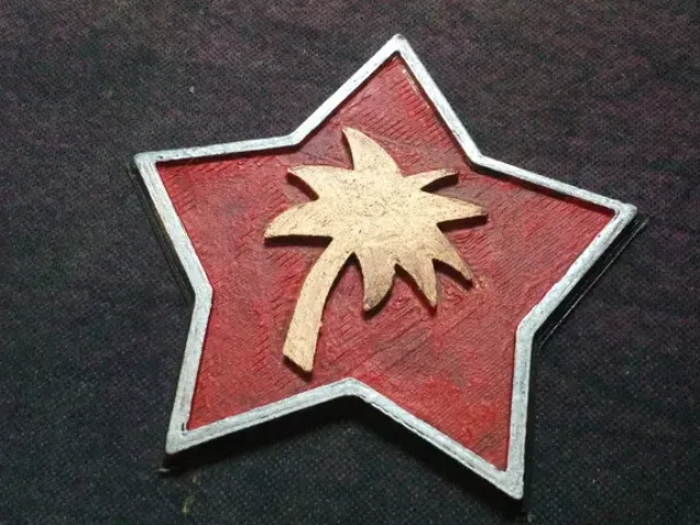 Tropico badge