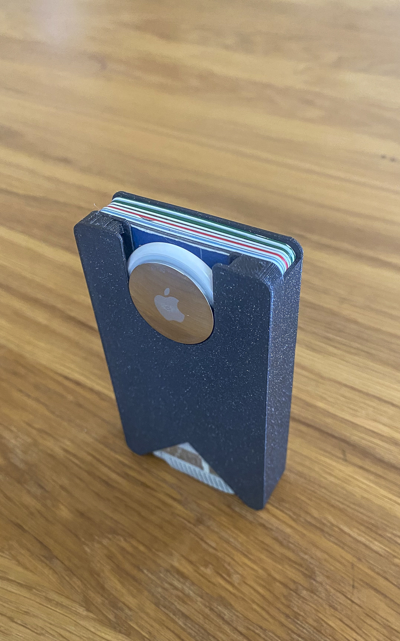 Compact wallet with AirTag for cards, bills and coins