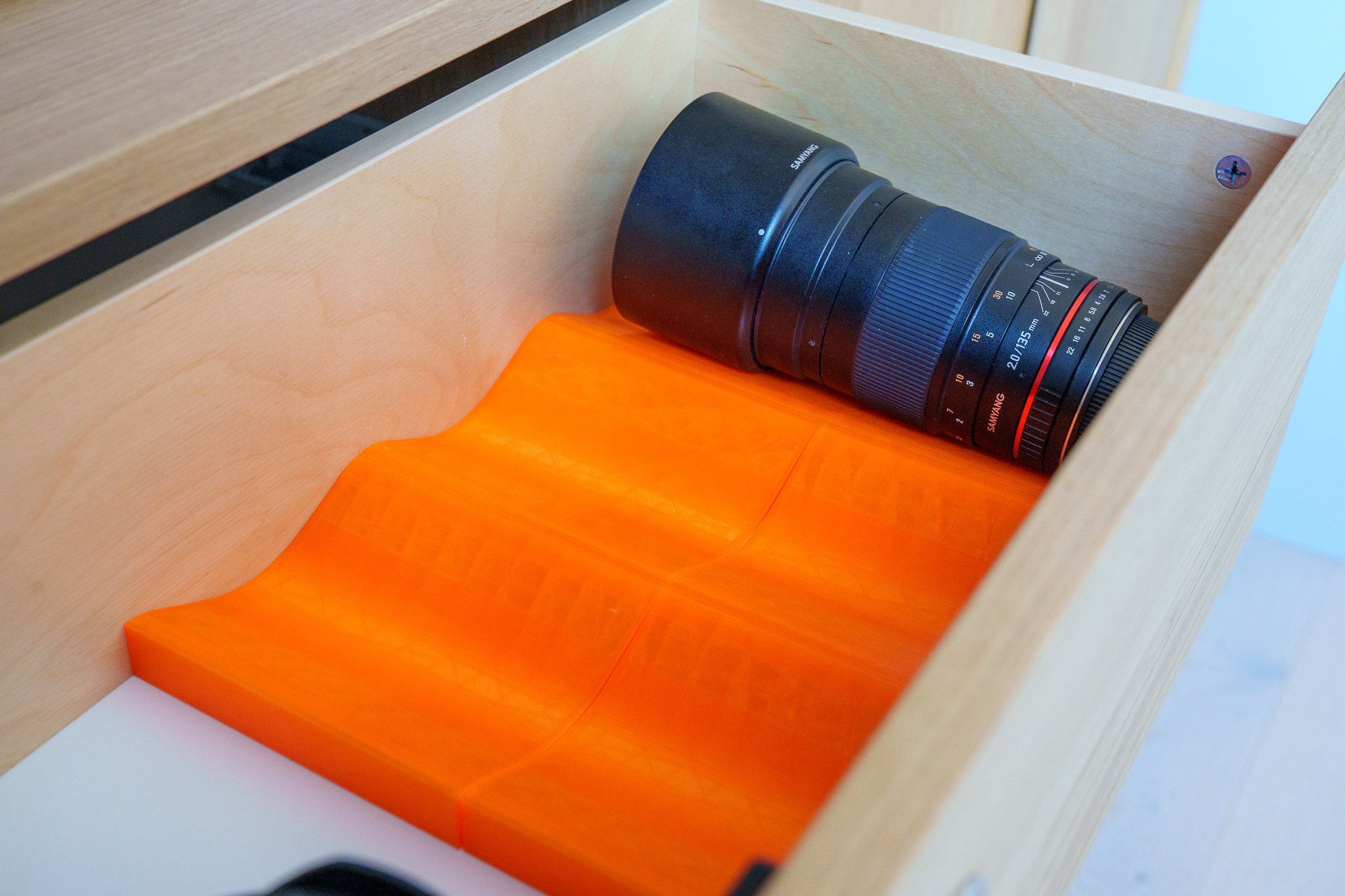 Lens drawer inlay