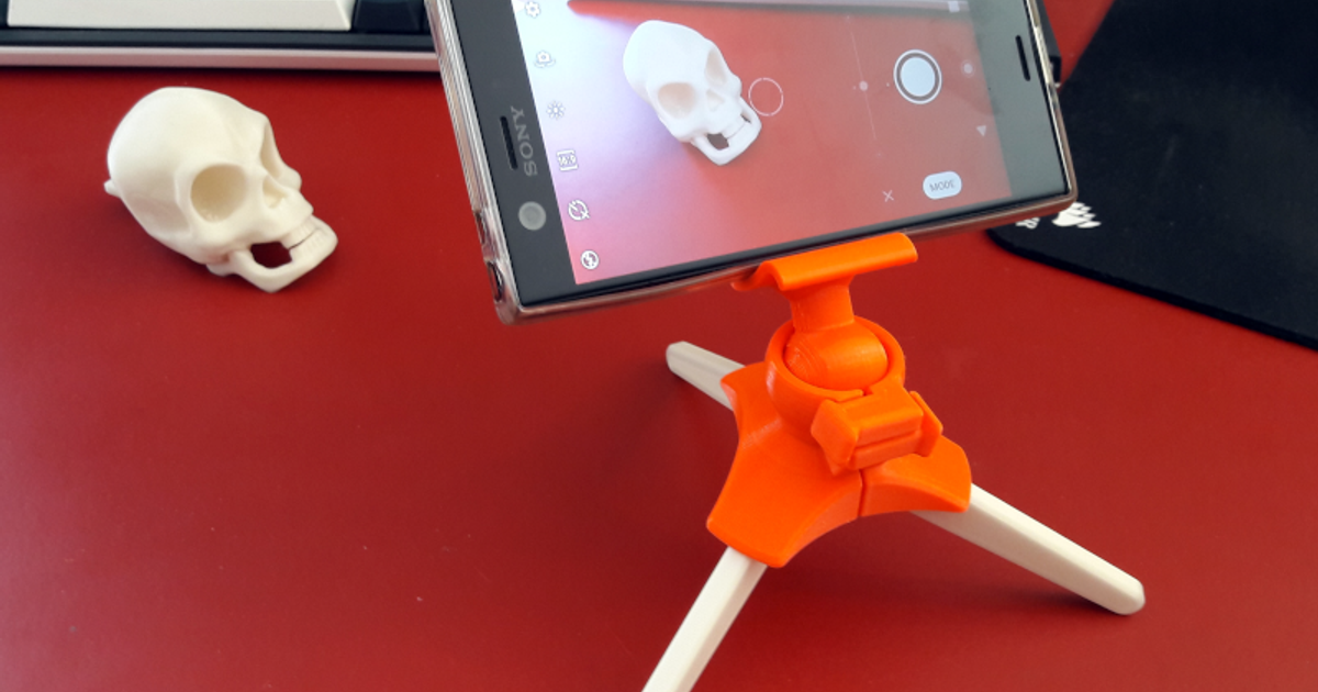 Phone tripod with squeeze mechanism by Muldjord Download free STL