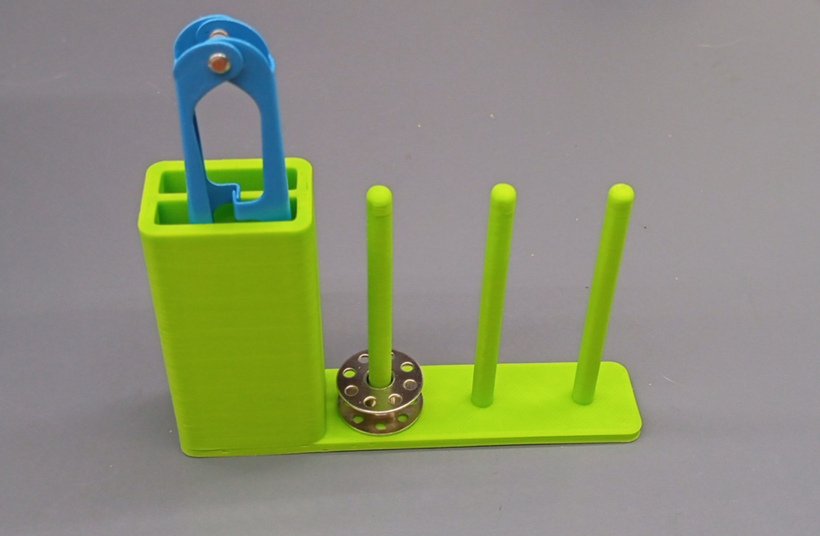 Magnetic attachment for sewing machine bobbins and tools