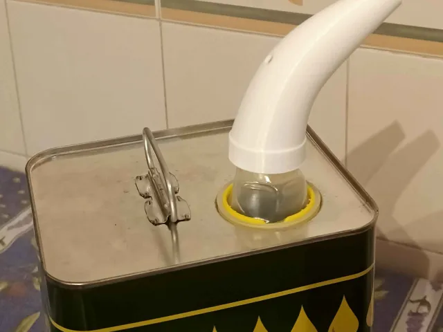 Spout pouring olive oil (or other fluids)