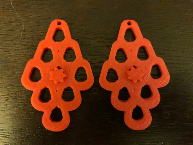 Circular Trapezoid Hole Flower Earrings