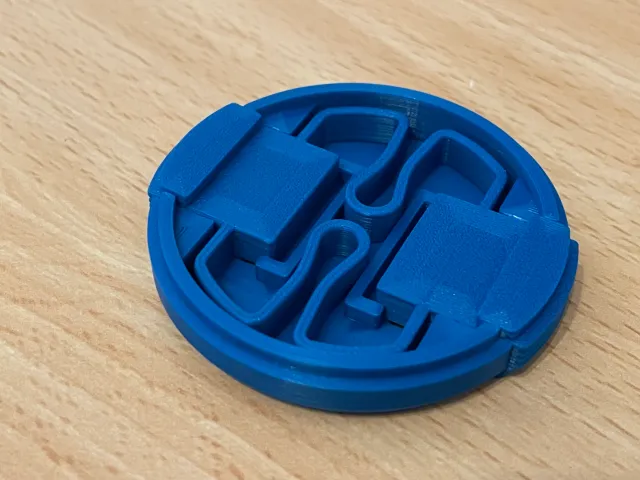 Loose fit jaw for deep 55mm lens cap by Kiril