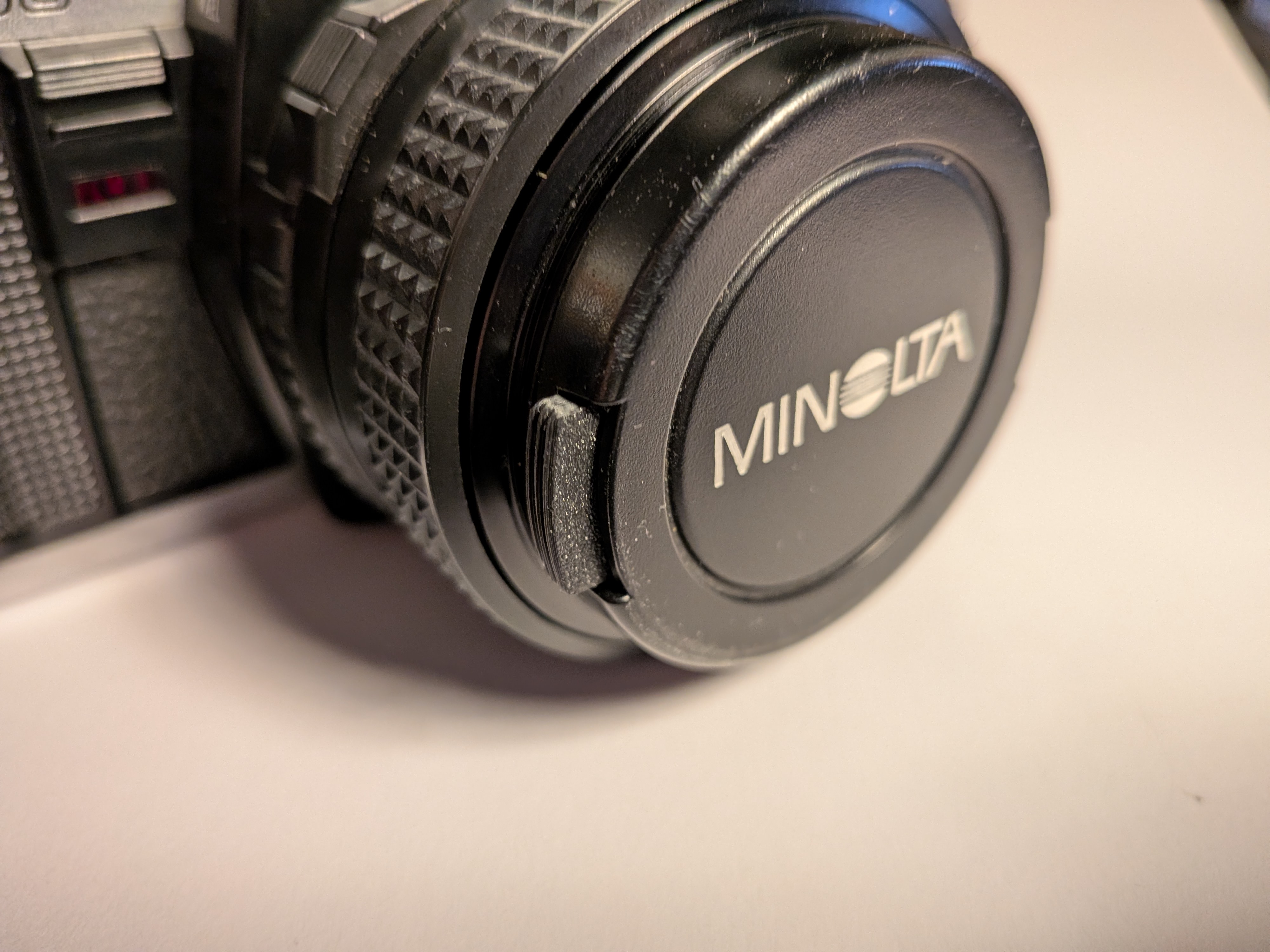 Minolta 49mm lens cap clip