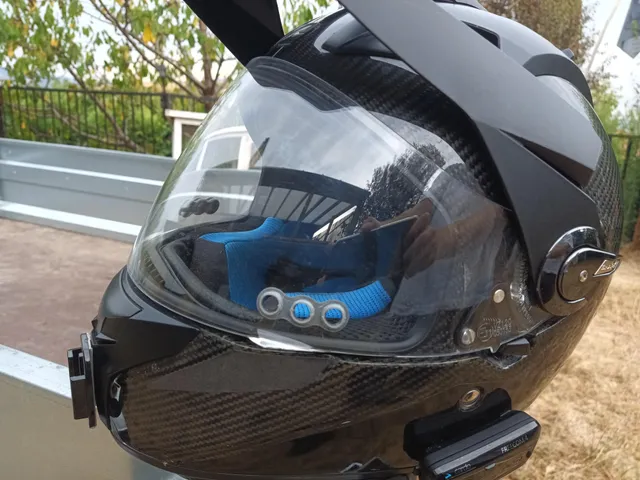 Motorcycle helmet visor drilled vents