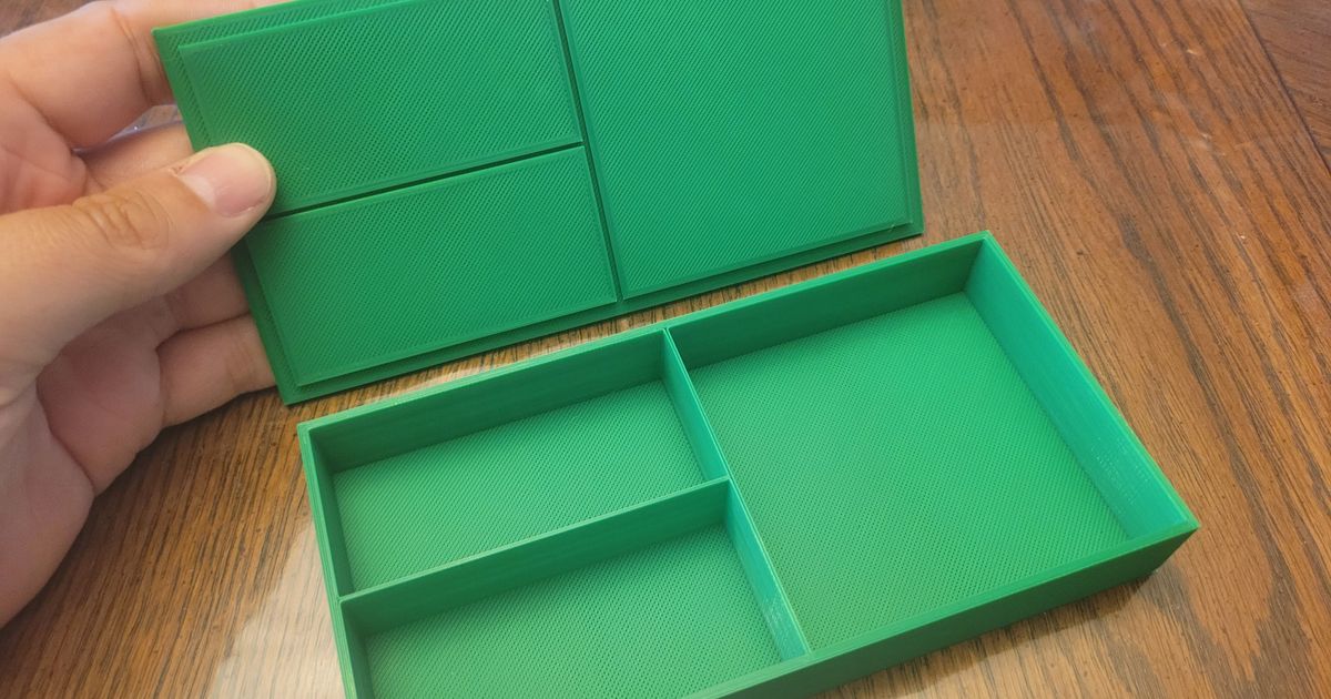 Divided box with friction fit lid by Rod MacPherson Download free STL