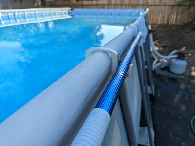 Pool pole holder