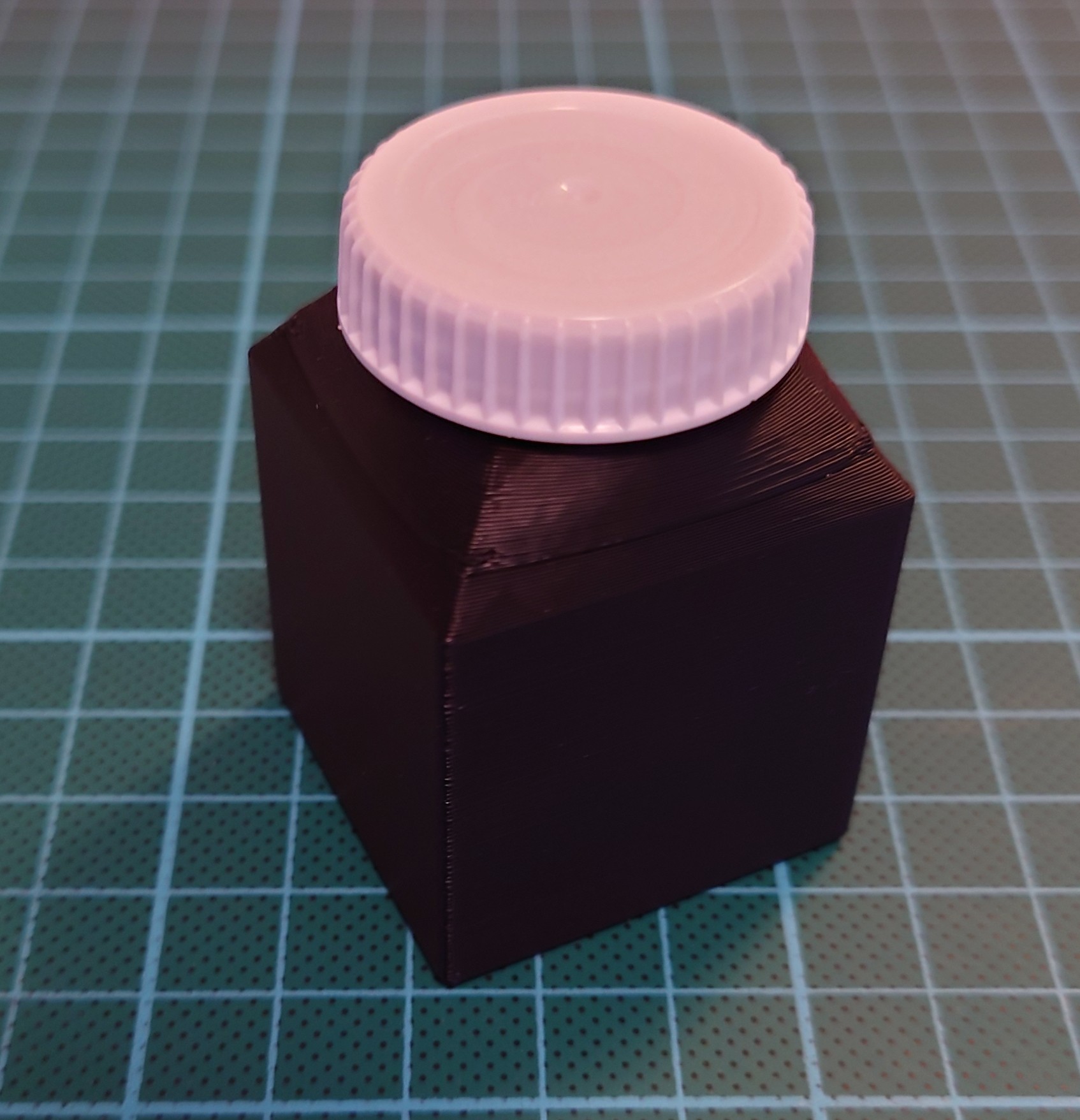 Watertight container with reused screw cap