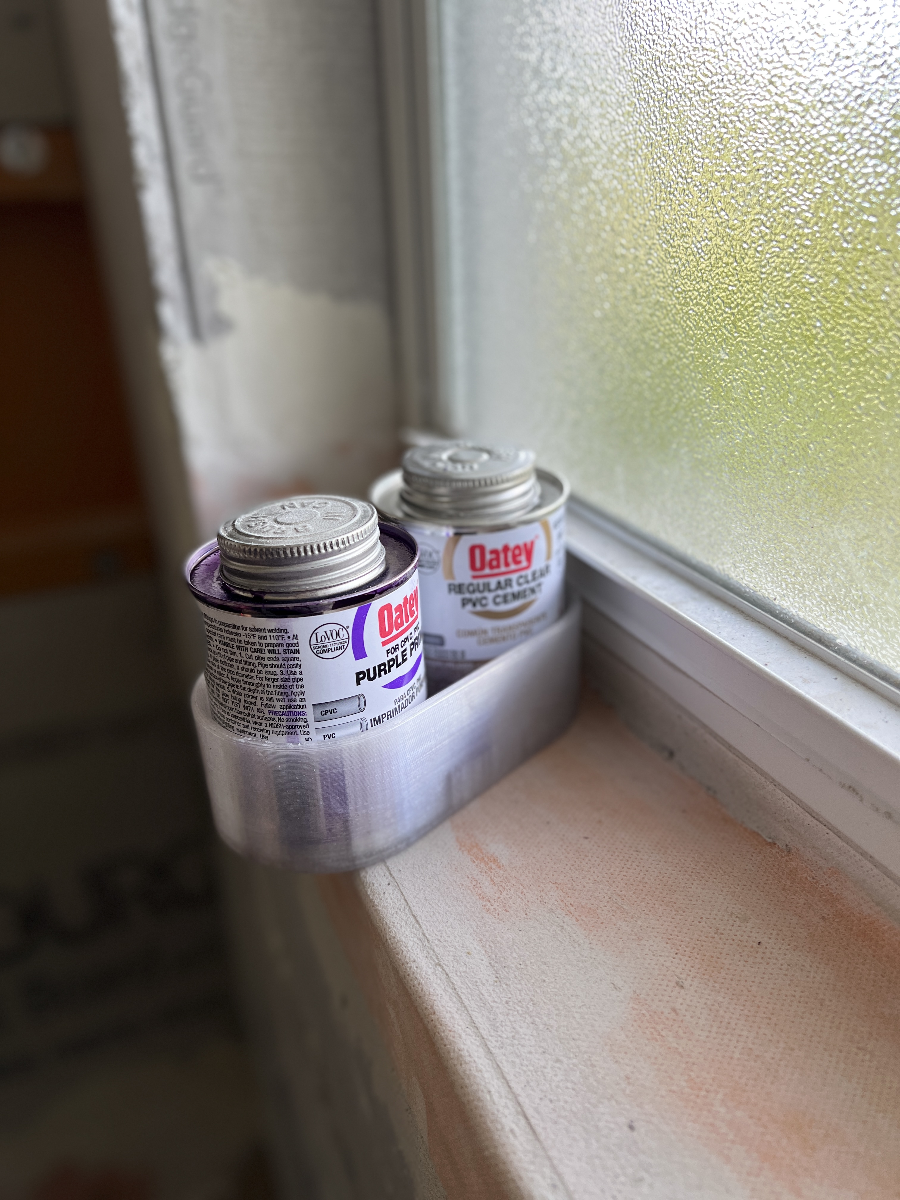 Can holder for 4 oz. PVC/ABS/CPVC cements, primers or cleaners.