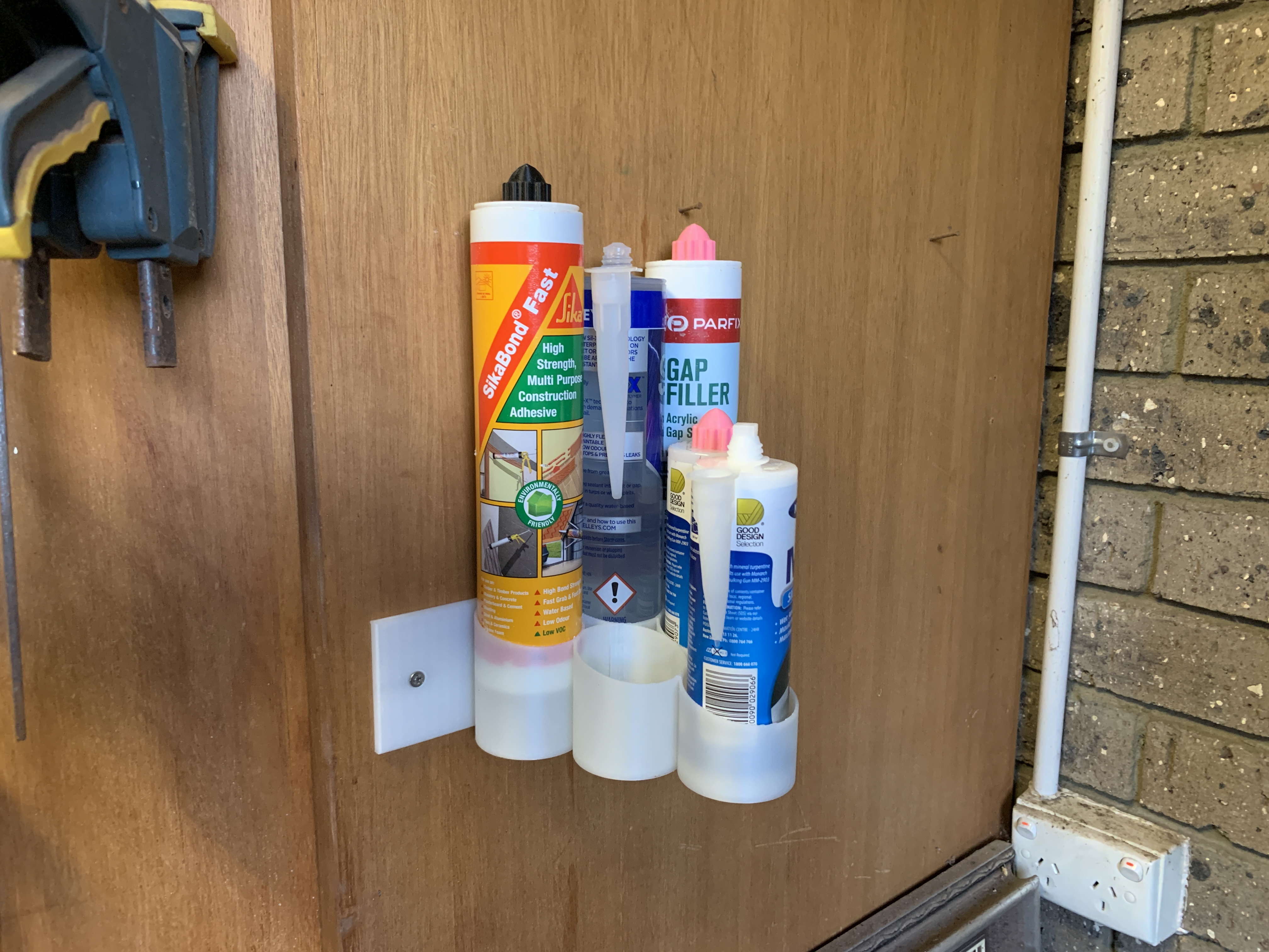 Caulk tube holder - wall mounted and free standing (plus test ring)