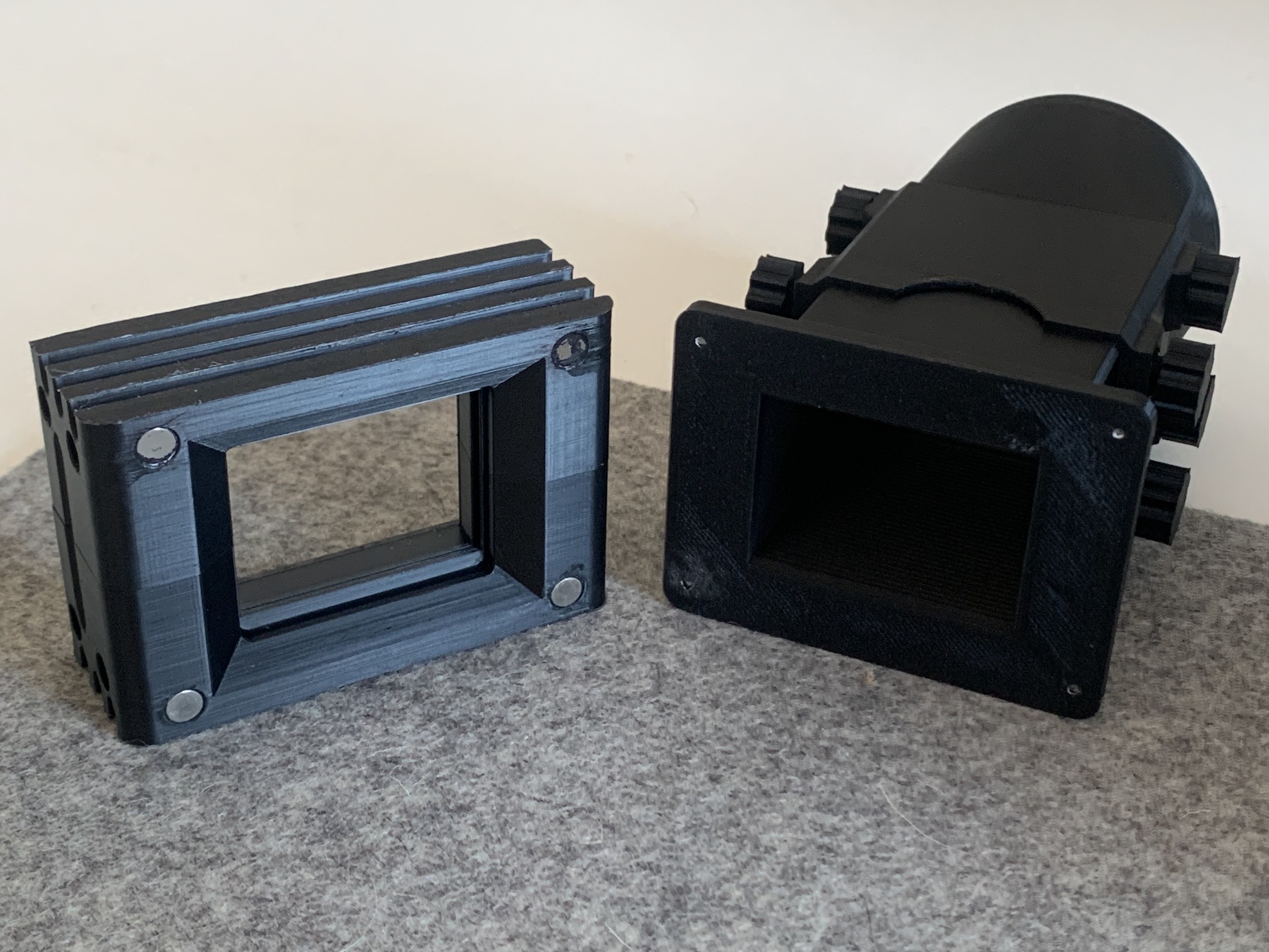 Modular film holder with magnetic lens