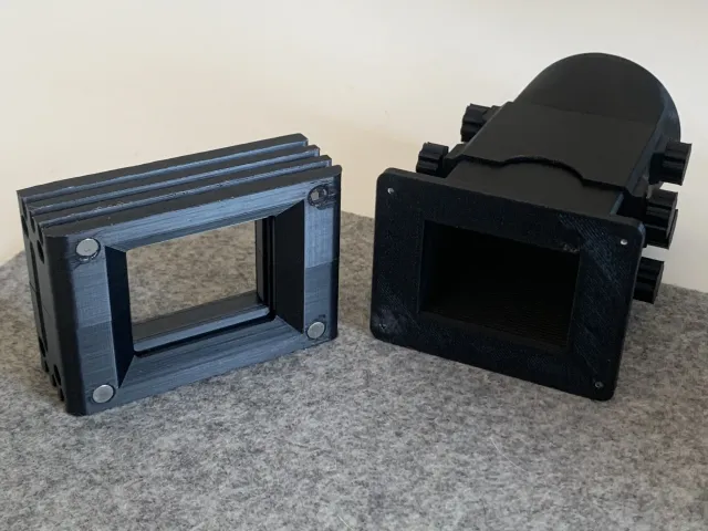 Modular film holder with magnetic lens