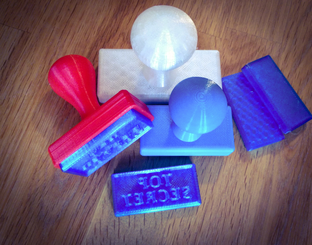 Custom Stamp with Exchangeable Text by cbaoth Download free STL model