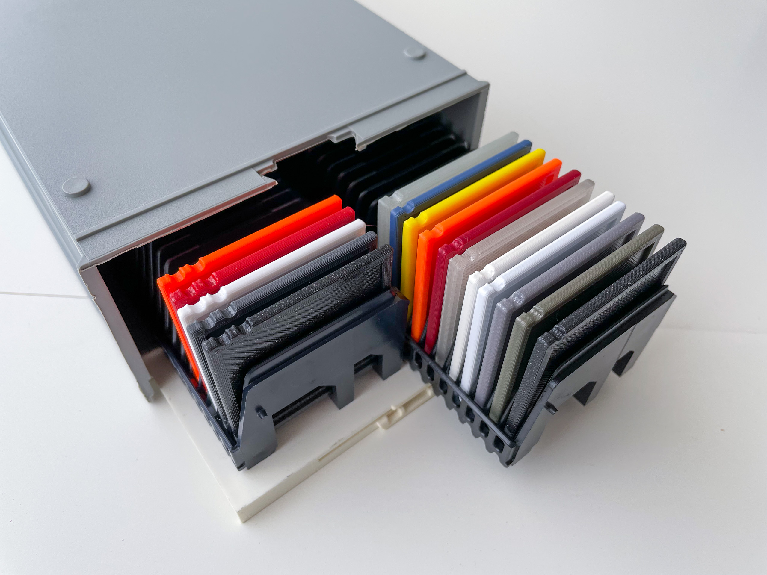 Filament swatches that fit in a slide tray or carousel