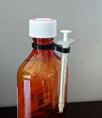 Medicine Bottle assisted opener and Syringe storage by richeyc2000, Download free STL model