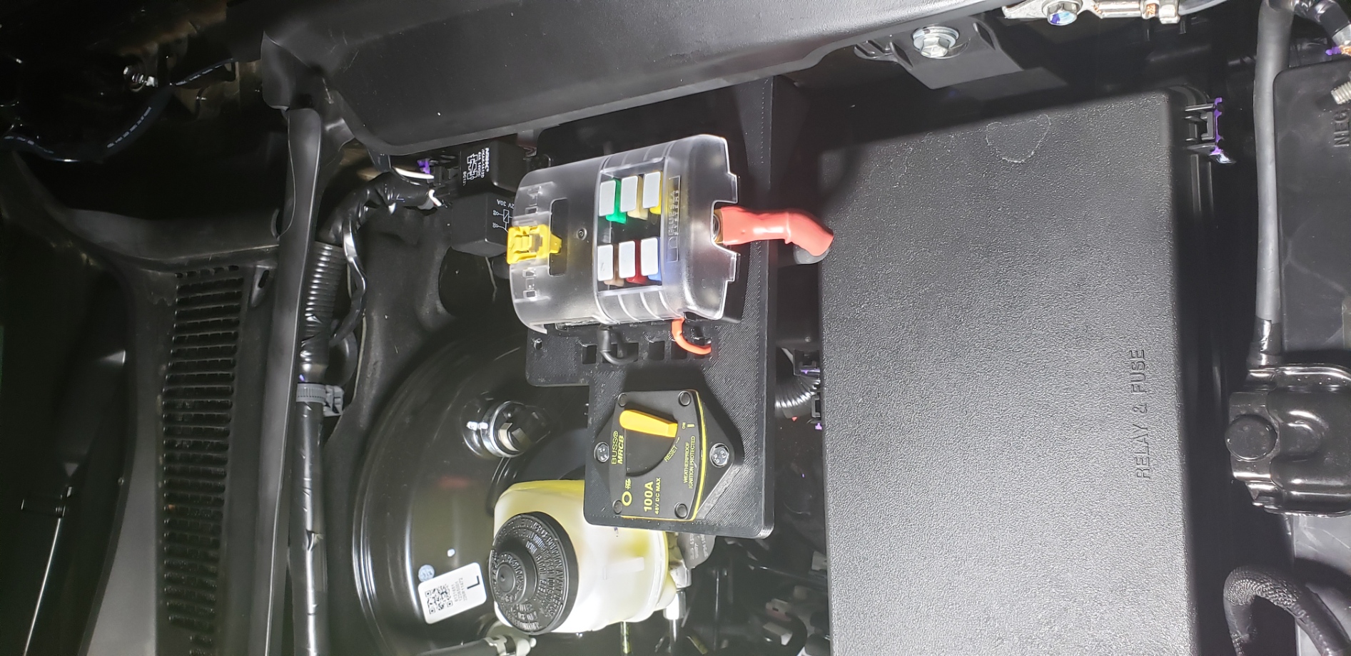 3rd gen Toyota Tacoma Blue Sea Systems fuse block and breaker mount