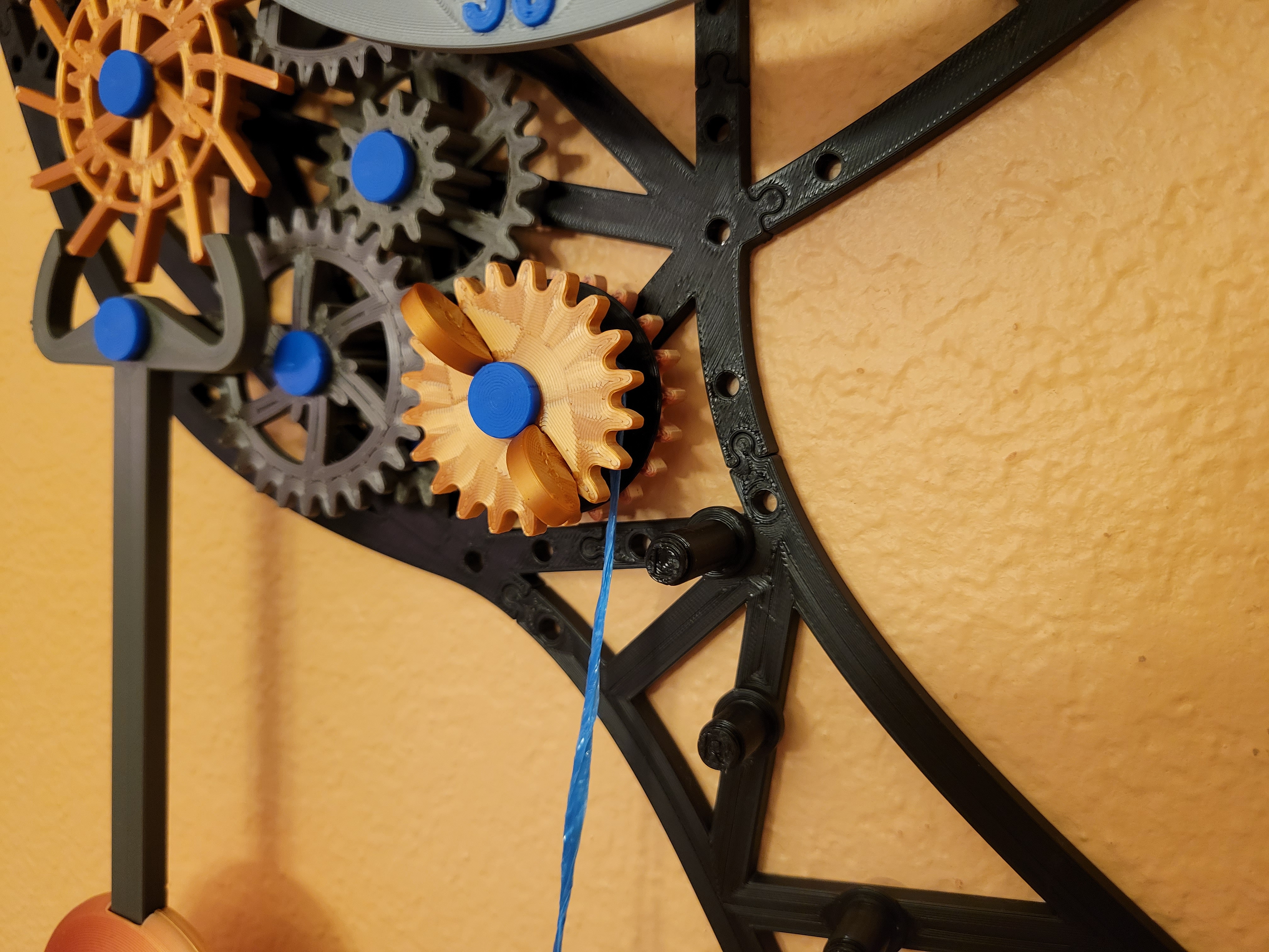 Remixed reel "gear" cover for mechanical wall clock
