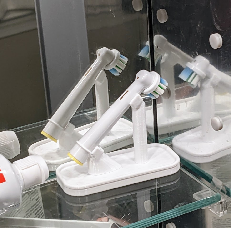 Oral-B toothbrush head holder