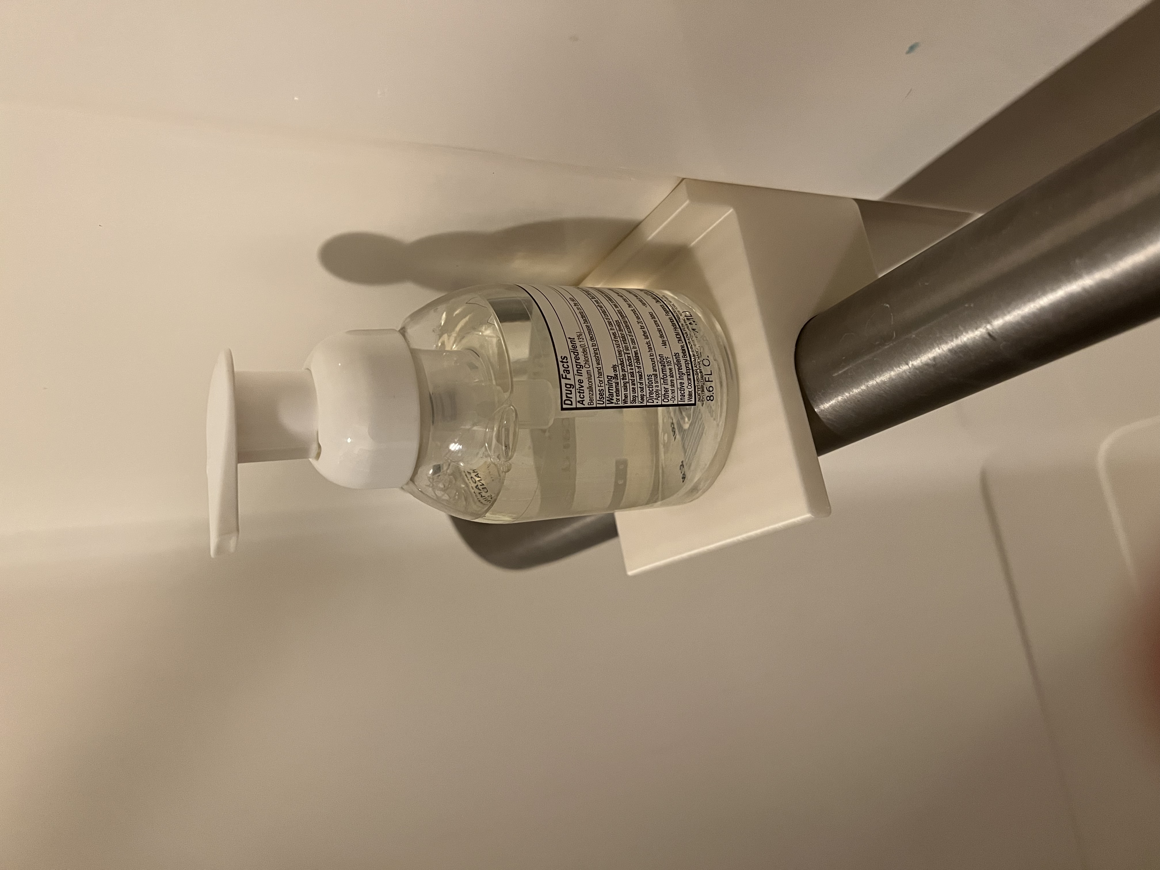 Shelf for shower grab bar