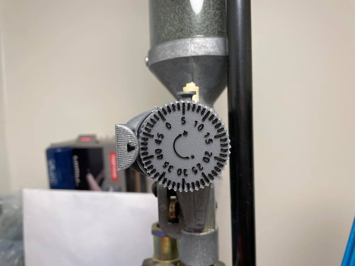 Dillon powder adjuster