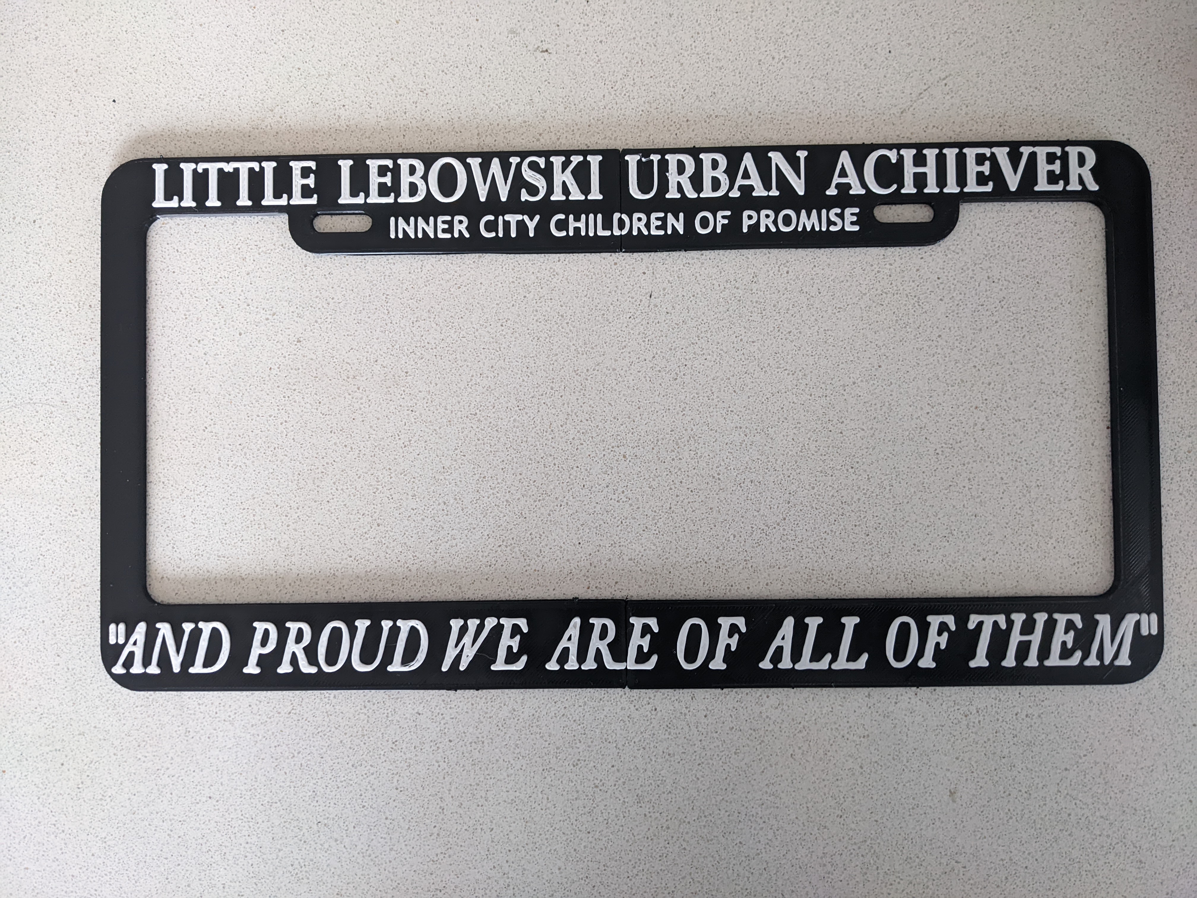 Lebowski Urban Achievers license plate frame