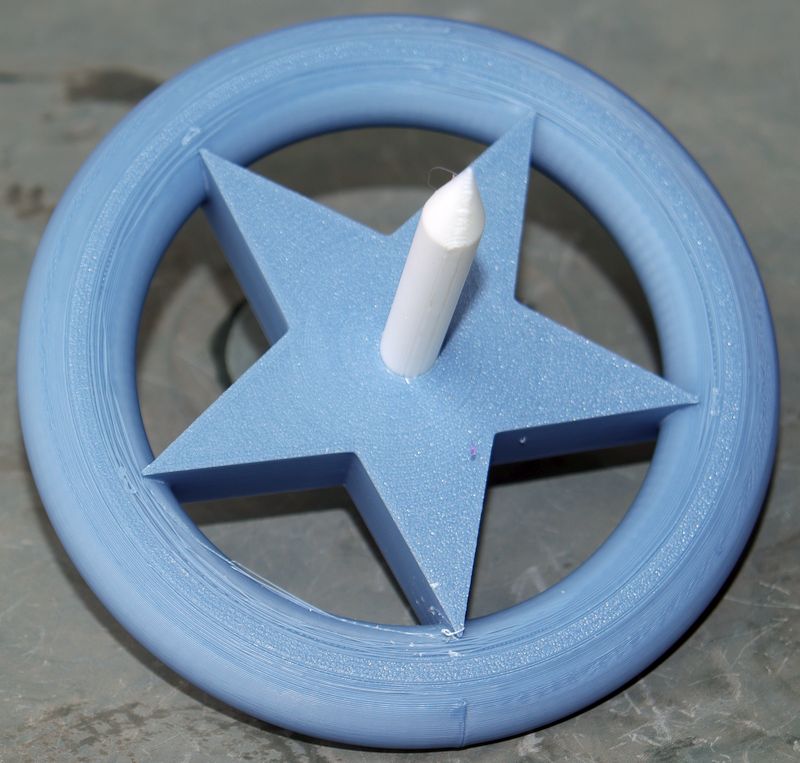 Star and Donut themed spinning top