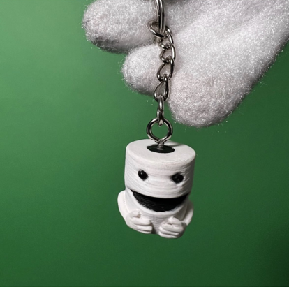 The Toiley keychain charm