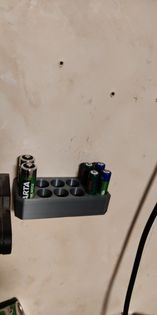 wall mounted battery holder