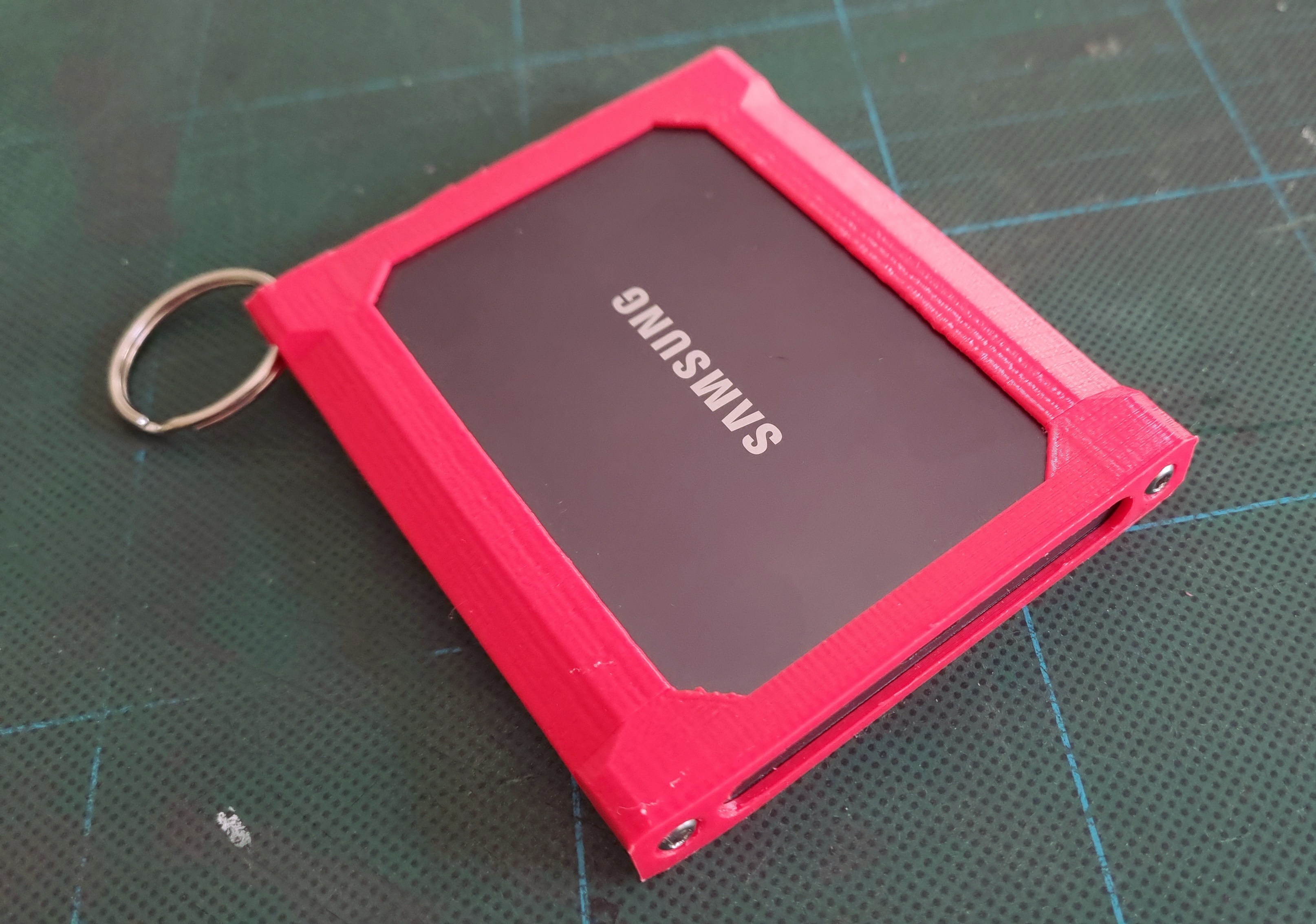 Samsung T7 SSD holder/mounting bracket by effae, Download free STL model