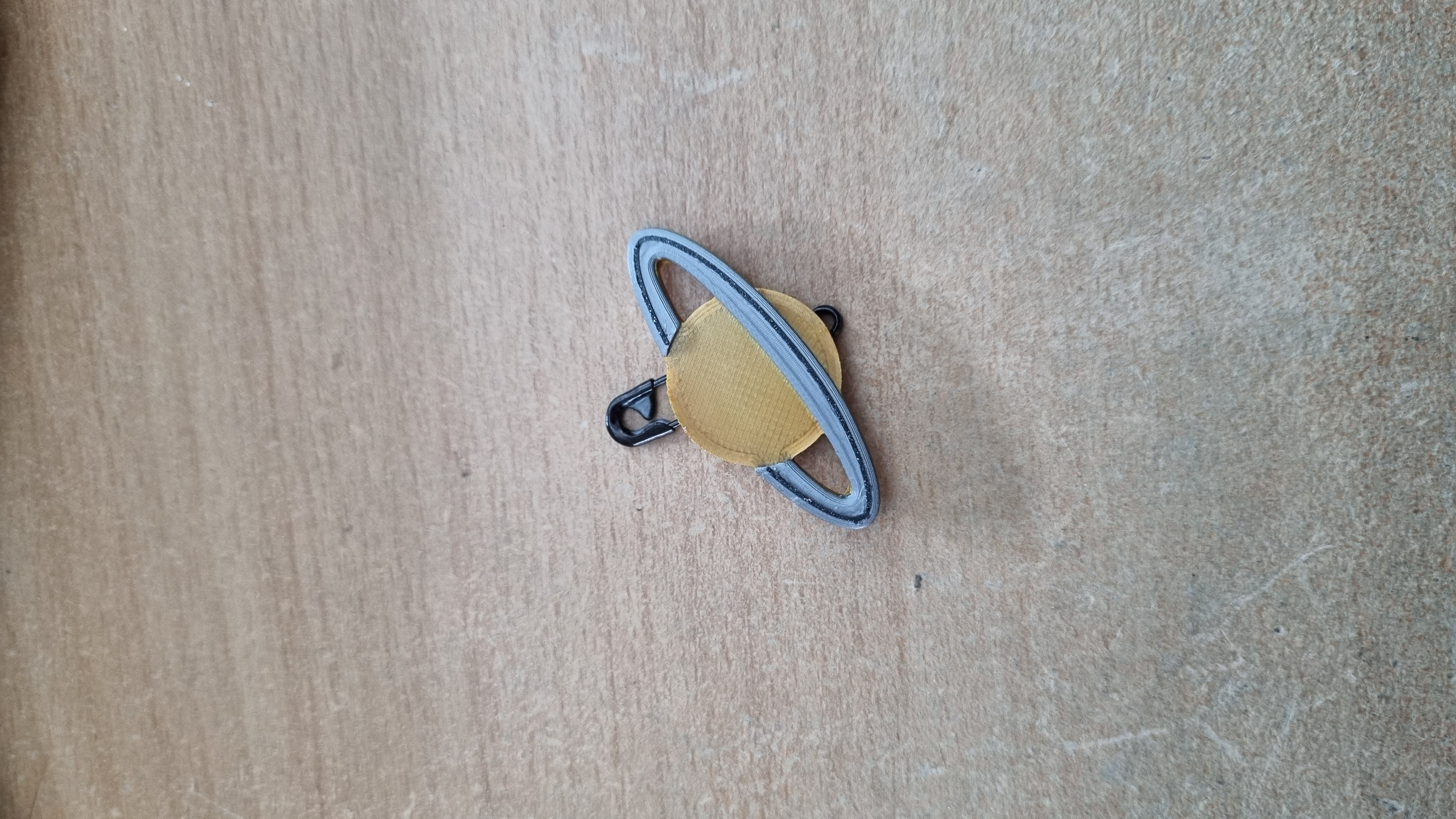 Small space pin badge (Saturn logo)