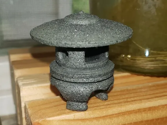 Miniature clawfoot garden pagoda stone lantern