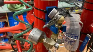 EVT inflator holster for EZ Lift repair stand