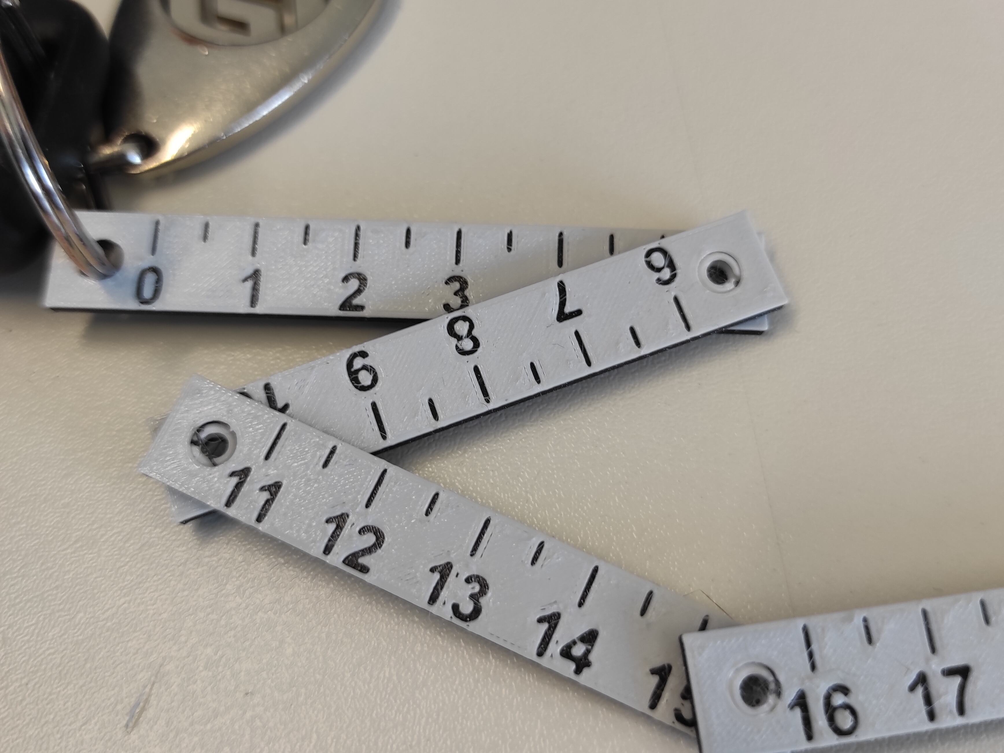 Foldable Ruler Keychain by JrBlackRaider Download free STL model